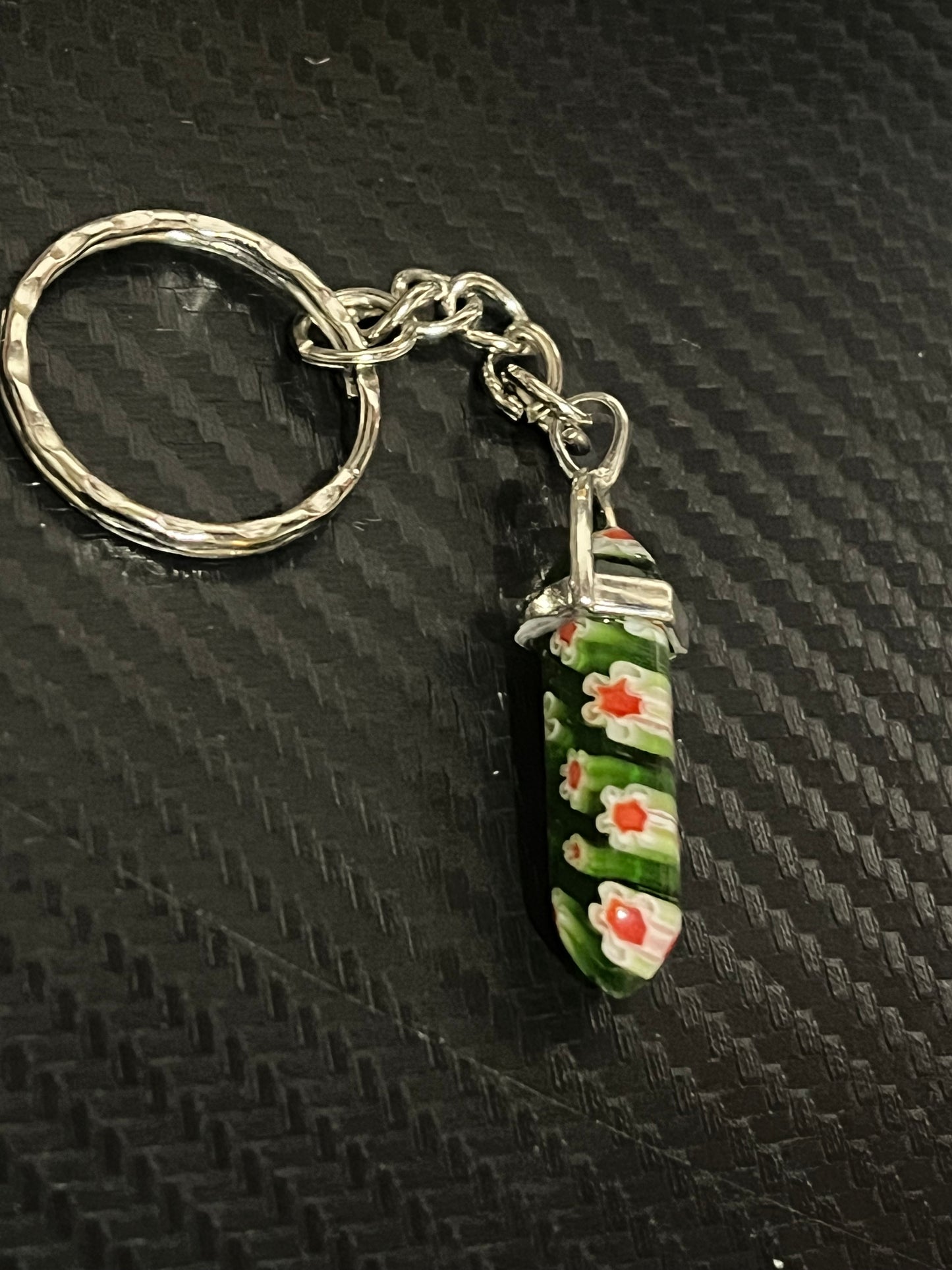 Green resin keychain with flowers