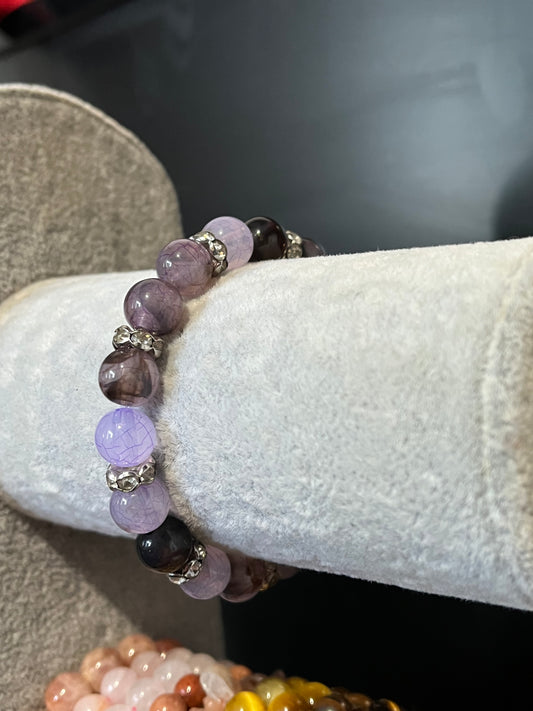 Amethyst gemstone beaded bracelet with silver separators
