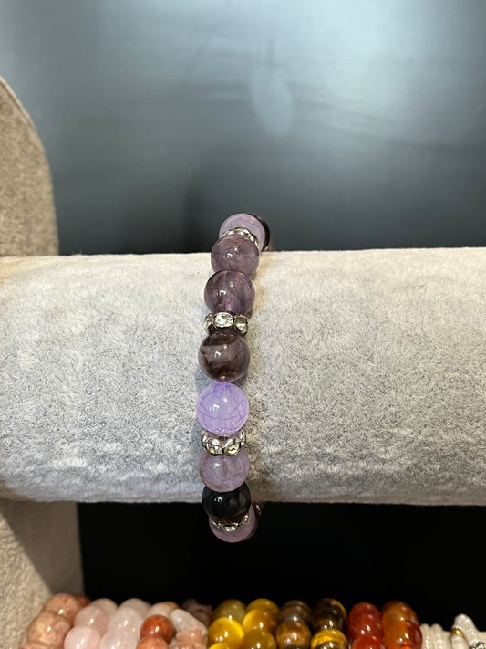 Amethyst gemstone beaded bracelet with silver separators