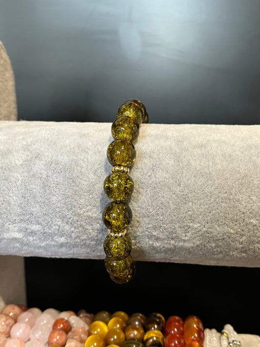 Green cracked glass bracelet with gold separators