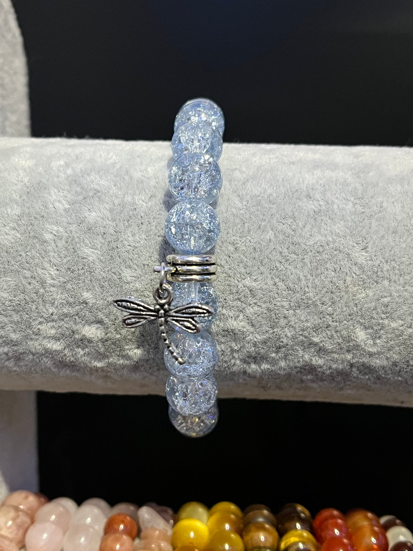 Light blue glass bracelet with silver dragonfly