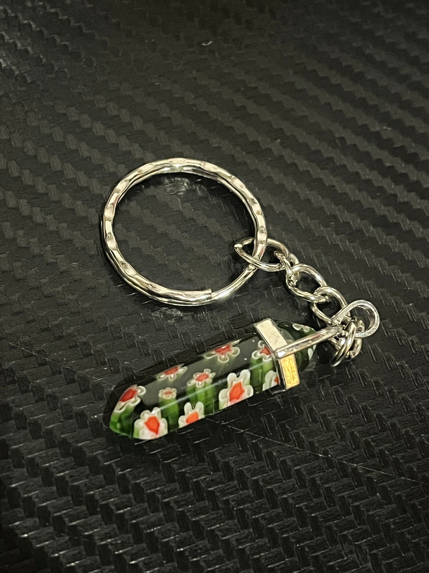 Green resin keychain with flowers