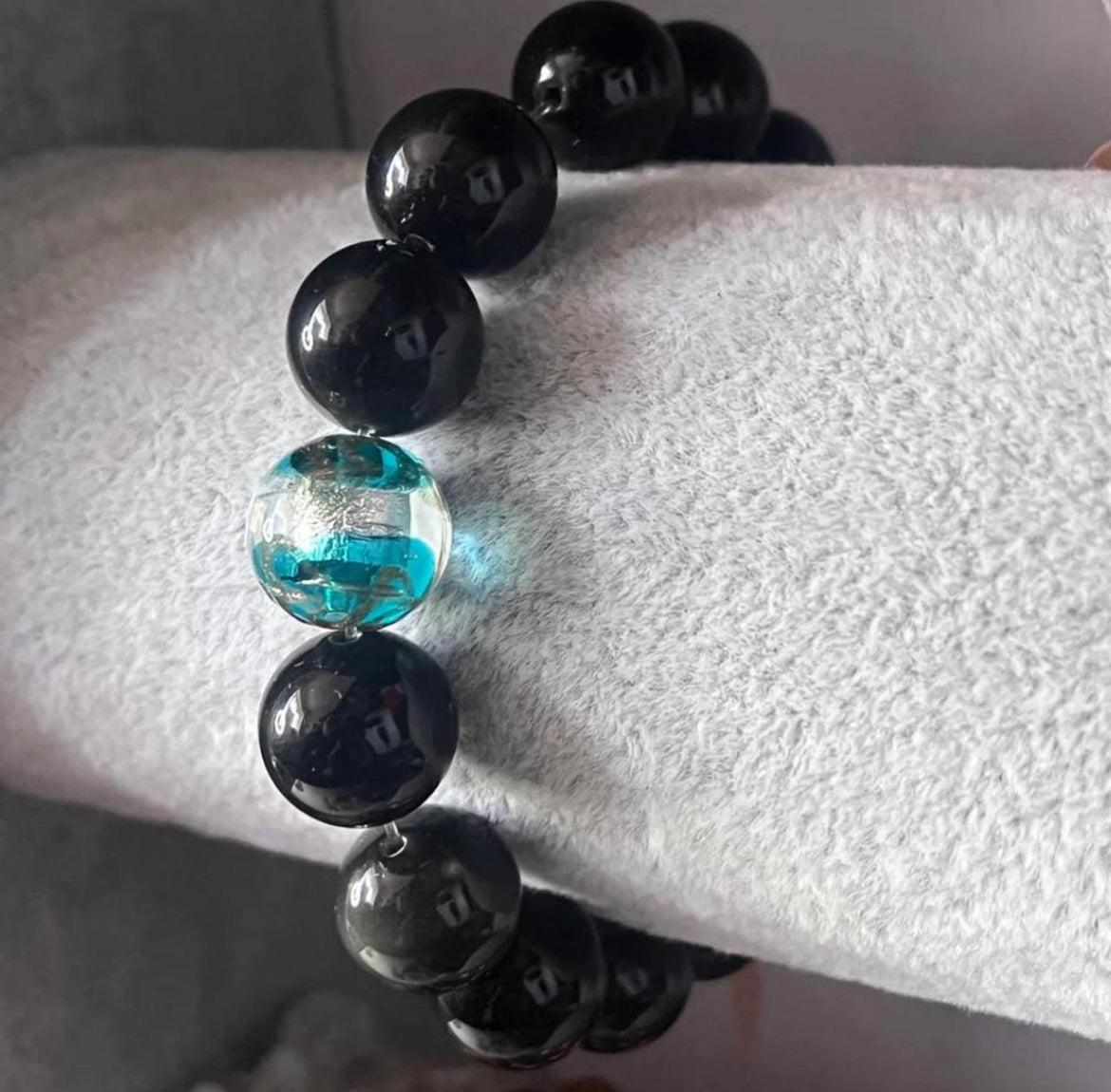Black bracelet with glass bead